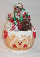 Ginger Bread Ceramic Bowl - This cute ginger bread ceramic bowl is filled with over  pound of yogurt covered pretzels,  pound of snowy praline peanuts, and  pound of chocolate covered almonds decorated with festive colored ribbons.
